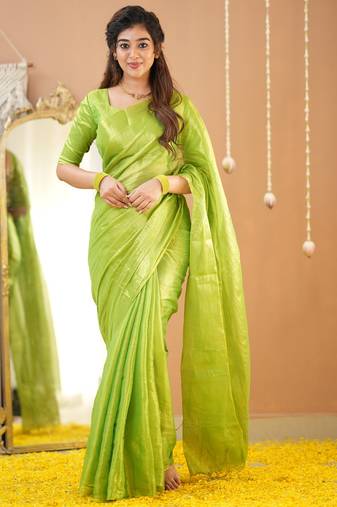 pista green handloom tissue saree with designer blouse