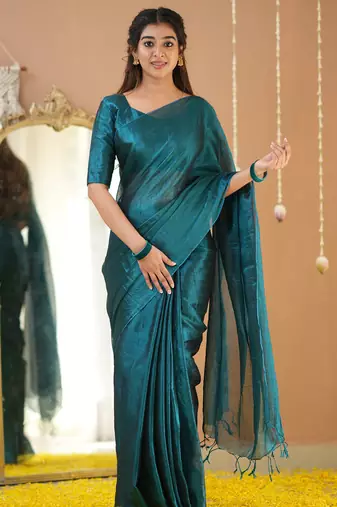 teal green handloom tissue saree with designer blouse