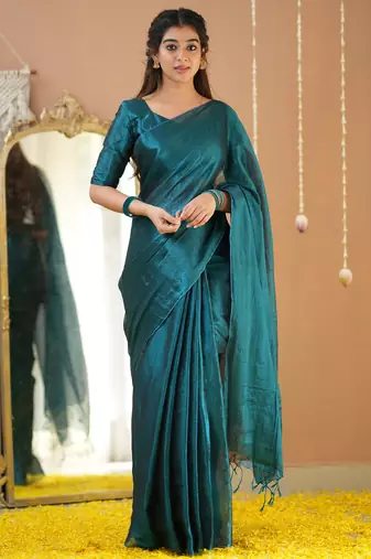teal green handloom tissue saree with designer blouse
