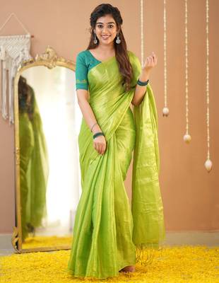 pista green handloom tissue saree with designer blouse 1