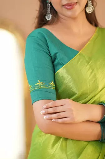 pista green handloom tissue saree with designer blouse