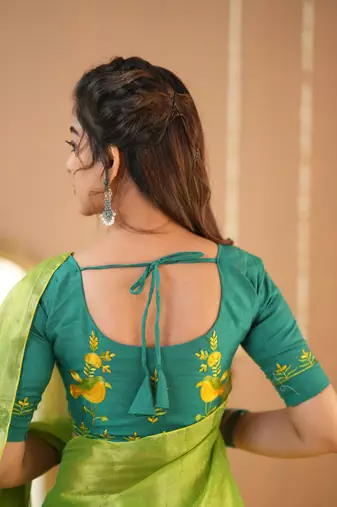 pista green handloom tissue saree with designer blouse
