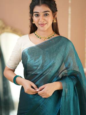 teal green handloom tissue saree with designer blouse 4