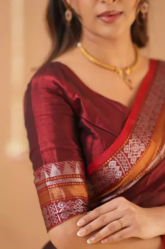 maroon handloom tissue saree with designer blouse