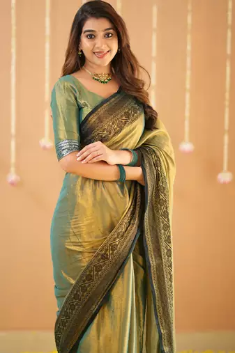 green handloom tissue saree with designer blouse