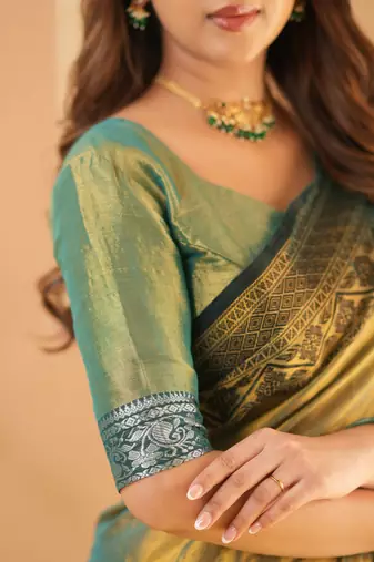 green handloom tissue saree with designer blouse