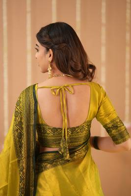 yellow handloom tissue saree with designer blouse 6
