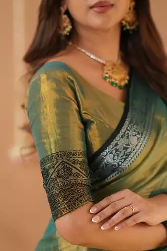 green handloom tissue saree with designer blouse