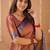 orange handloom tissue saree with designer blouse