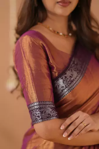 orange handloom tissue saree with designer blouse