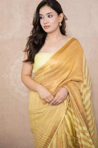 yellow striped zari linen saree