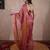 pink zari saree with striped pallu