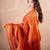 red zari saree with striped pallu