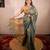 green saree with zari stripes