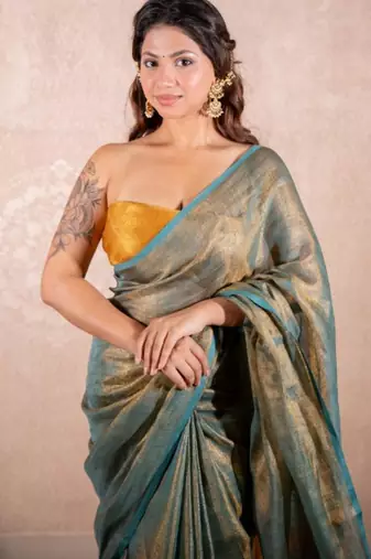 green saree with zari stripes