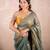green saree with zari stripes