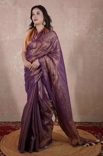 purple saree with striped pallu