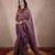 purple saree with striped pallu