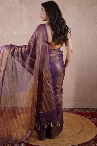 purple saree with striped pallu