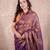 purple saree with striped pallu