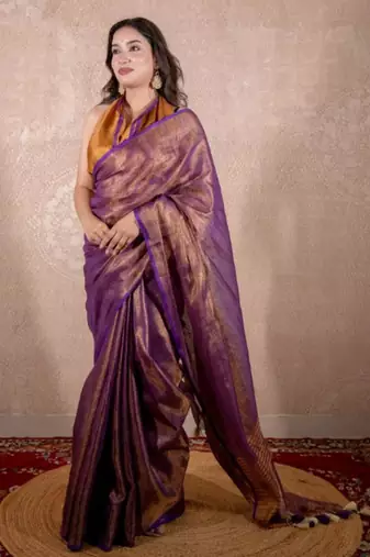 purple saree with striped pallu