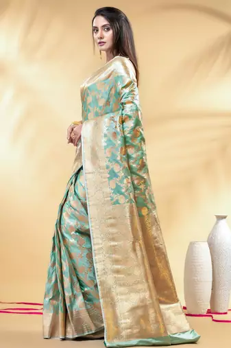sea green katan banarasi silk blend saree with golden zari weaving