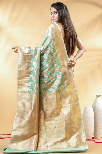 sea green katan banarasi silk blend saree with golden zari weaving