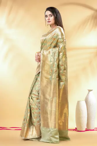 pistachio green katan banarasi silk blend saree with golden zari weaving