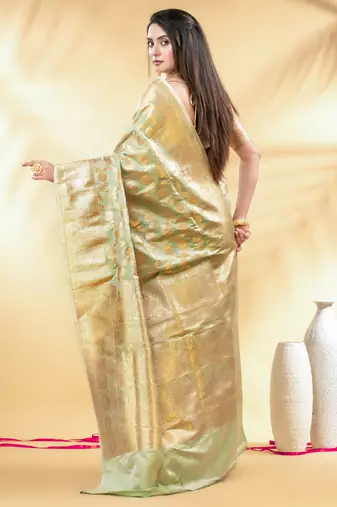 pistachio green katan banarasi silk blend saree with golden zari weaving