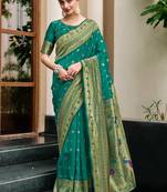 Green woven floral silk blend zari weaving paithani saree
