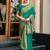 Green woven floral silk blend zari weaving paithani saree