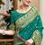 Green woven floral silk blend zari weaving paithani saree