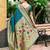 Deep teal woven floral silk blend zari weaving paithani saree