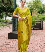 Light green woven floral silk blend zari weaving paithani saree
