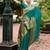 Green woven floral silk blend zari weaving paithani saree