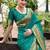 Green woven floral silk blend zari weaving paithani saree