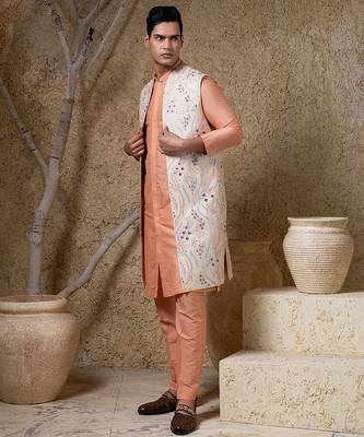 White embroidered cotton silk jacket paired with orange kurta & pant 1