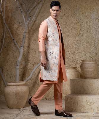 White embroidered cotton silk jacket paired with orange kurta & pant 2