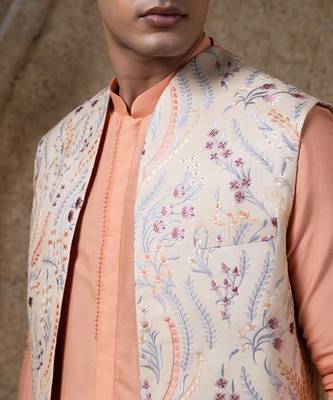 White embroidered cotton silk jacket paired with orange kurta & pant 3