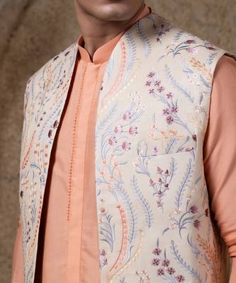 White embroidered cotton silk jacket paired with orange kurta & pant 4