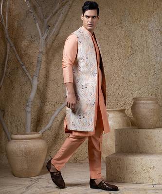 White embroidered cotton silk jacket paired with orange kurta & pant 5