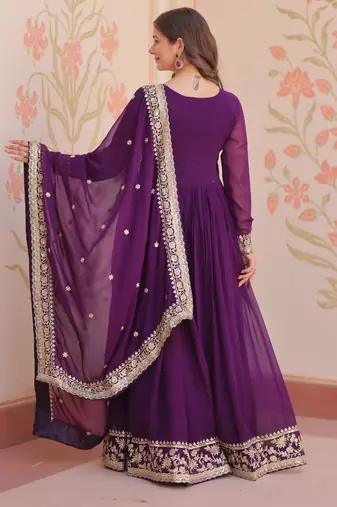 Purple color faux georgette zari and sequins embroidered partywear gown with dupatta