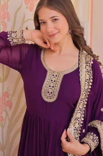 Purple color faux georgette zari and sequins embroidered partywear gown with dupatta