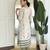 Off white color smart and ethnic readymade kurta set for casual and formal looks