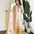 Off white color smart and ethnic readymade kurta set for casual and formal looks