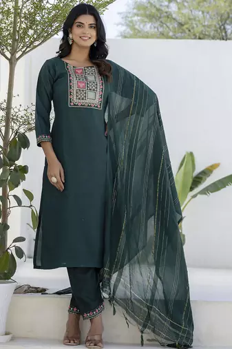 Green color cotton blend readymade kurta set for girls' ethnic festive looks
