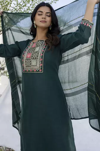 Green color cotton blend readymade kurta set for girls' festive looks