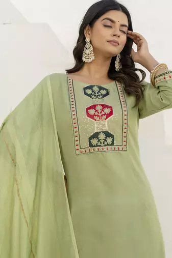 Pista color cotton blend readymade kurta set for girls' festive looks