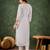 Peach color roman silk blend ethnic kurta set for embroidered ceremonial looks