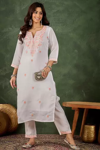Peach color roman silk blend kurta set for embroidered ceremonial looks